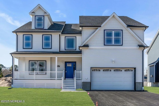 1 Potters Ct, Bayville, NJ 08721 - view of front facade with a porch, a garage, driveway, and a front lawn