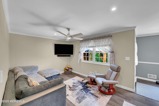 512 Highland Ter, Brick, NJ 08723 - living area with ornamental molding, wood finished floors, baseboards, ceiling fan, and recessed lighting