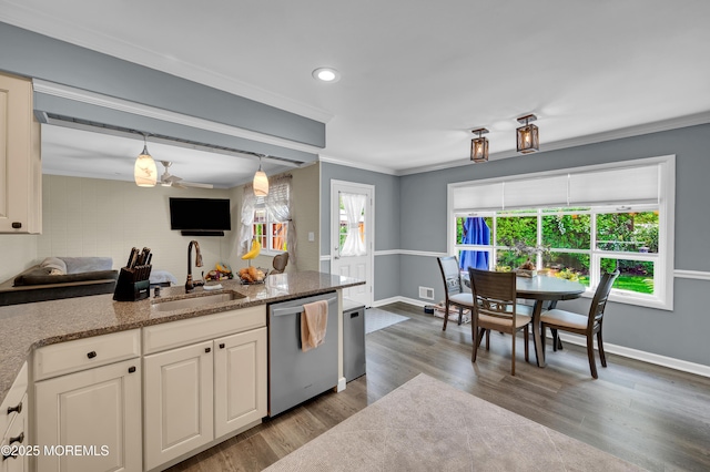 512 Highland Ter, Brick, NJ 08723 - kitchen with stainless steel dishwasher, a sink, crown molding, baseboards, and wood finished floors
