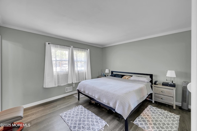 512 Highland Ter, Brick, NJ 08723 - bedroom with ornamental molding, baseboards, and wood finished floors