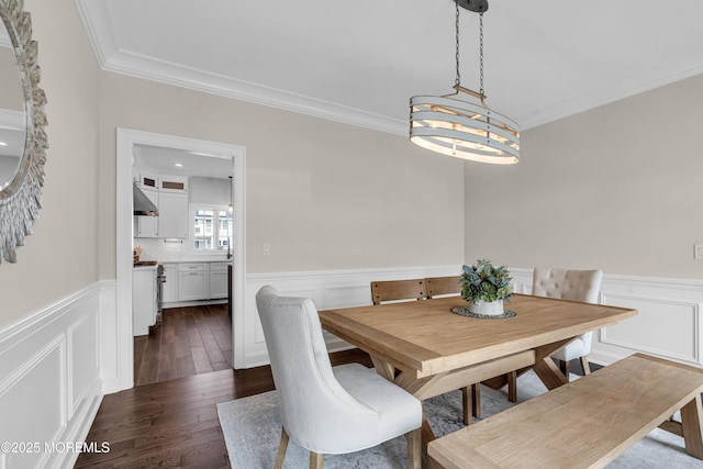 333 Barkentine Ln, Mantoloking, NJ 08738 - dining room with ornamental molding, wainscoting, dark wood-type flooring, and a decorative wall
