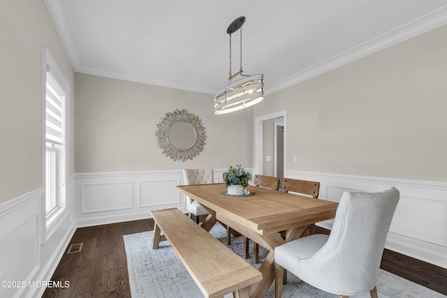 333 Barkentine Ln, Mantoloking, NJ 08738 - dining space featuring ornamental molding, dark wood-style floors, and a wainscoted wall