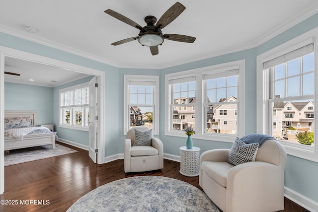 333 Barkentine Ln, Mantoloking, NJ 08738 - sitting room with ceiling fan, baseboards, dark wood-type flooring, and crown molding
