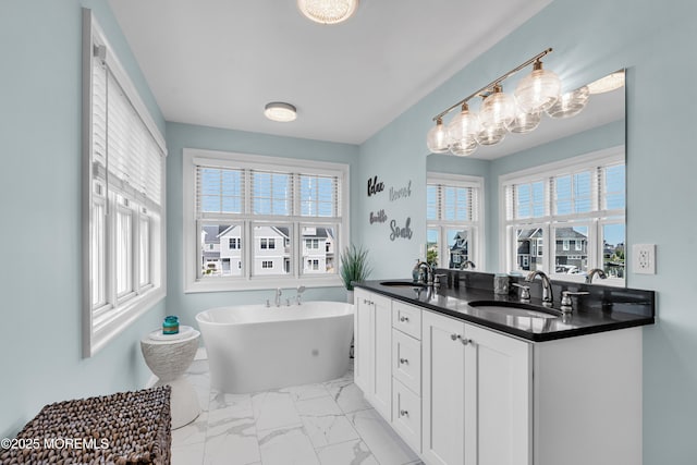 333 Barkentine Ln, Mantoloking, NJ 08738 - full bath with marble finish flooring, a freestanding bath, and double vanity