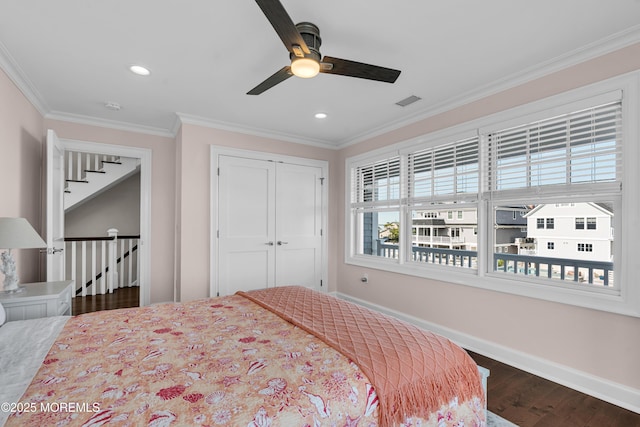 333 Barkentine Ln, Mantoloking, NJ 08738 - bedroom with baseboards, dark wood finished floors, crown molding, a closet, and recessed lighting