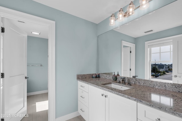 333 Barkentine Ln, Mantoloking, NJ 08738 - bathroom with vanity and baseboards