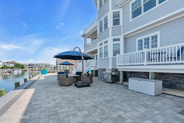 333 Barkentine Ln, Mantoloking, NJ 08738 - view of patio with grilling area, a water view, an outdoor hangout area, and a dock