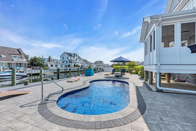 333 Barkentine Ln, Mantoloking, NJ 08738 - outdoor pool with a patio, a water view, and a residential view
