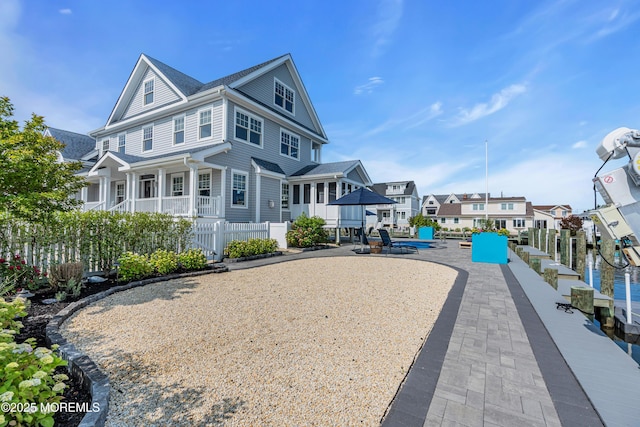 333 Barkentine Ln, Mantoloking, NJ 08738 - back of house featuring a residential view and a porch