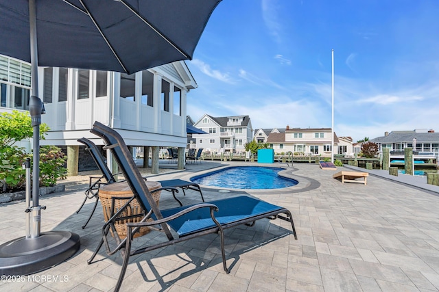 333 Barkentine Ln, Mantoloking, NJ 08738 - swimming pool with a patio area and a residential view