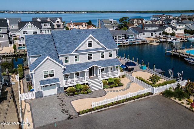 333 Barkentine Ln, Mantoloking, NJ 08738 - view of front of home with a garage, a residential view, and a water view
