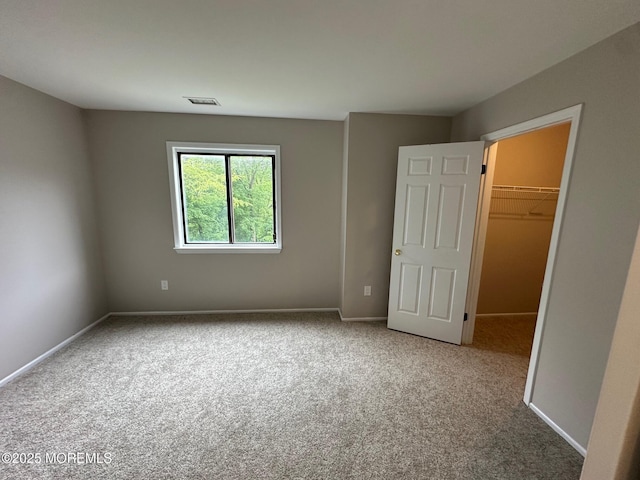 1508 Alpine Trl Unit 1508, Neptune Township, NJ 07753 - unfurnished bedroom featuring carpet, a spacious closet, baseboards, and a closet
