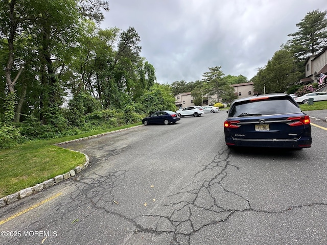 1508 Alpine Trl Unit 1508, Neptune Township, NJ 07753 - view of asphalt road featuring curbs