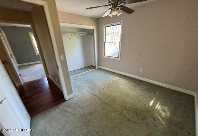 90 Statesir Pl, Red Bank, NJ 07701 - unfurnished bedroom with carpet flooring, a closet, baseboards, and a ceiling fan