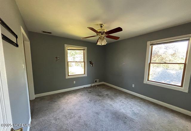 90 Statesir Pl, Red Bank, NJ 07701 - carpeted spare room featuring baseboards and a ceiling fan
