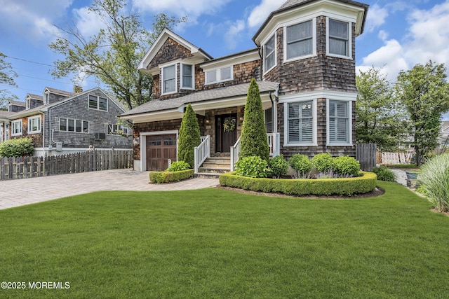 2117 Seagull Ter, Point Pleasant, NJ 08742 - shingle-style home featuring decorative driveway and a garage