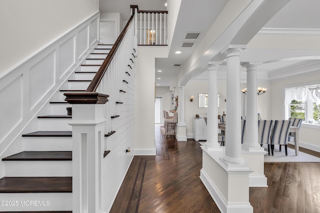 2117 Seagull Ter, Point Pleasant, NJ 08742 - stairway with wood finished floors, crown molding, arched walkways, and recessed lighting