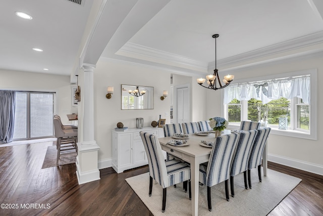 2117 Seagull Ter, Point Pleasant, NJ 08742 - dining area with a chandelier, ornamental molding, baseboards, ornate columns, and dark wood-type flooring
