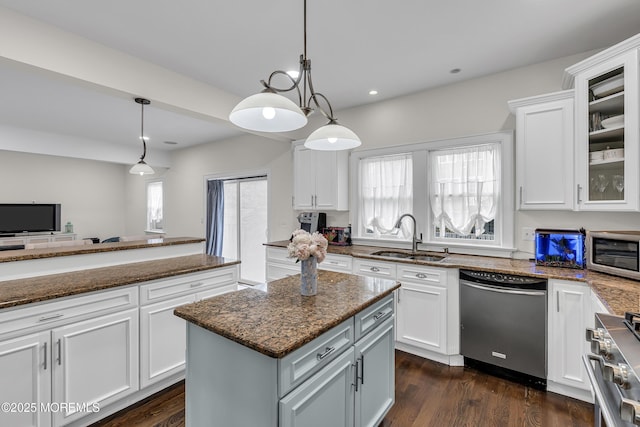 2117 Seagull Ter, Point Pleasant, NJ 08742 - kitchen featuring stainless steel appliances, a sink, healthy amount of natural light, white cabinets, and recessed lighting