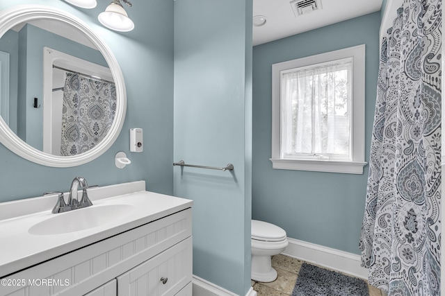2117 Seagull Ter, Point Pleasant, NJ 08742 - full bathroom with vanity, toilet, baseboards, and curtained shower