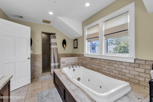 2117 Seagull Ter, Point Pleasant, NJ 08742 - bathroom featuring a stall shower, a whirlpool tub, recessed lighting, wainscoting, and vanity