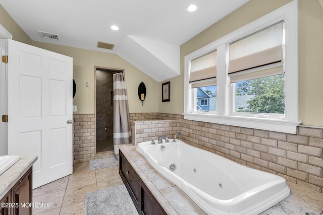 2117 Seagull Ter, Point Pleasant, NJ 08742 - full bath featuring a shower stall, a whirlpool tub, tile walls, a wainscoted wall, and recessed lighting