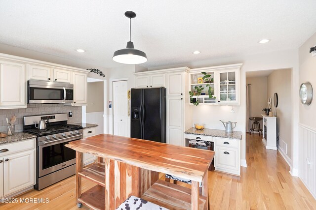 15 Tanglewood Dr, Barnegat, NJ 08005 - kitchen featuring appliances with stainless steel finishes, light wood-type flooring, white cabinets, backsplash, and recessed lighting