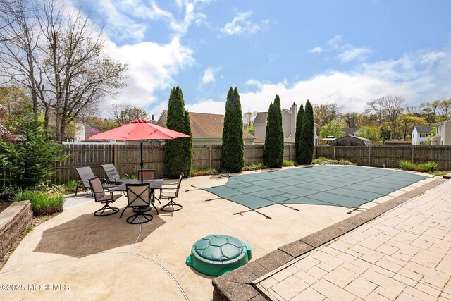15 Tanglewood Dr, Barnegat, NJ 08005 - view of swimming pool featuring a patio, a fenced backyard, and outdoor dining area