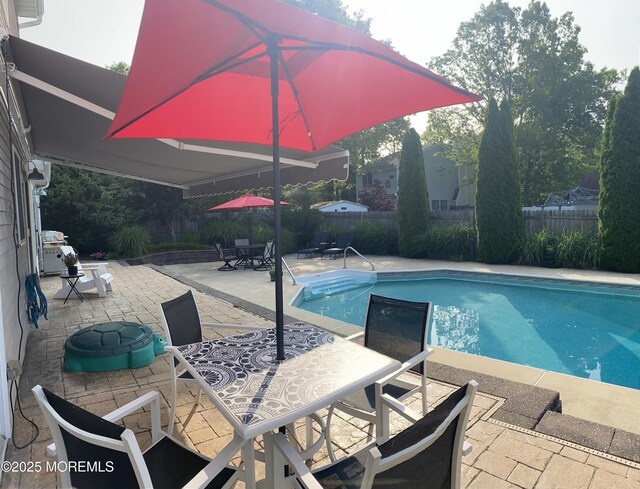 15 Tanglewood Dr, Barnegat, NJ 08005 - view of swimming pool featuring outdoor dining space, a patio, and a fenced backyard