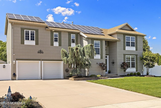 28 Hannah Lee Rd, Barnegat, NJ 08005 - traditional home with roof mounted solar panels, driveway, a garage, and a shingled roof