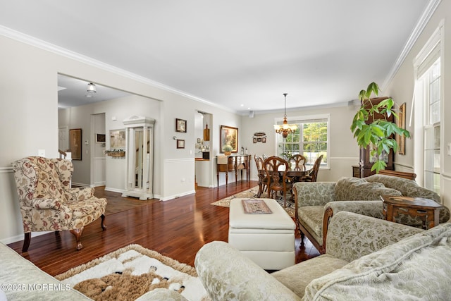 28 Hannah Lee Rd, Barnegat, NJ 08005 - living area with wood finished floors, crown molding, baseboards, and a chandelier