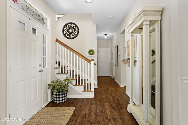 28 Hannah Lee Rd, Barnegat, NJ 08005 - foyer entrance with wood finished floors, stairway, decorative columns, and baseboards
