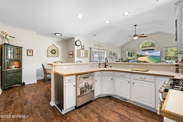 28 Hannah Lee Rd, Barnegat, NJ 08005 - kitchen with stainless steel dishwasher, a sink, a ceiling fan, dark wood finished floors, and wainscoting