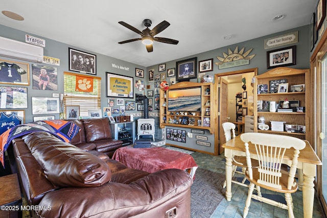 28 Hannah Lee Rd, Barnegat, NJ 08005 - living area featuring a wood stove and a ceiling fan