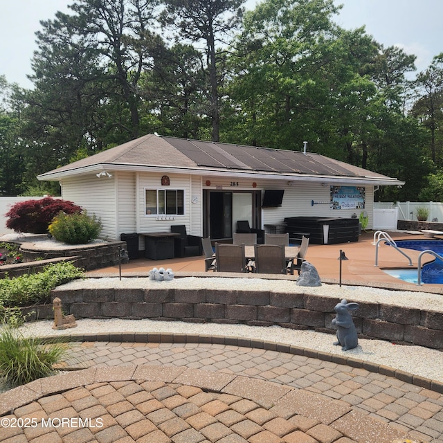 28 Hannah Lee Rd, Barnegat, NJ 08005 - rear view of property with a hot tub, a patio, and outdoor dining area