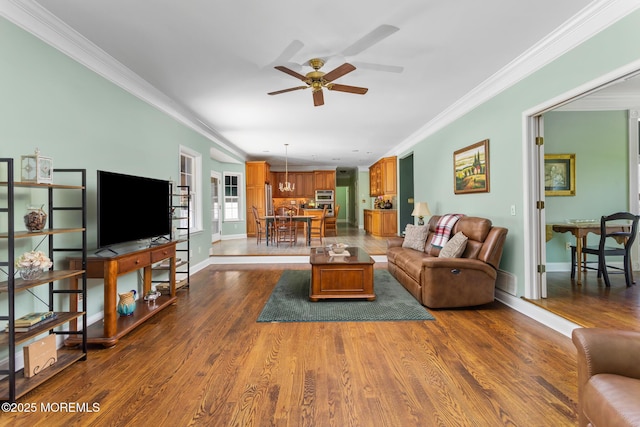 1 Yeger Dr, Upper Freehold, NJ 08501 - living area featuring a ceiling fan, ornamental molding, dark wood finished floors, and baseboards