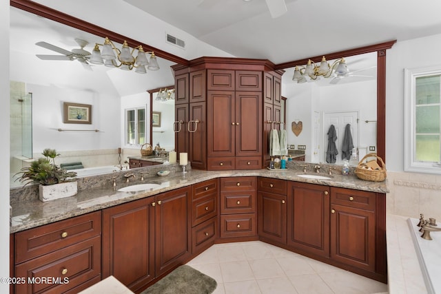 1 Yeger Dr, Upper Freehold, NJ 08501 - full bath featuring a ceiling fan, double vanity, tile patterned floors, and a garden tub
