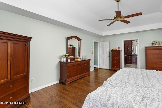 1 Yeger Dr, Upper Freehold, NJ 08501 - bedroom featuring dark wood finished floors, baseboards, a raised ceiling, connected bathroom, and ceiling fan
