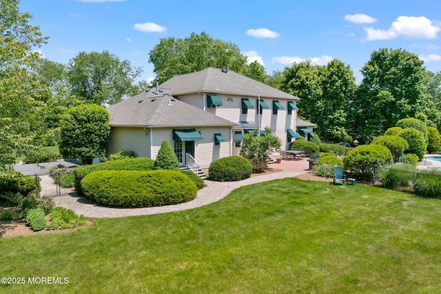 1 Yeger Dr, Upper Freehold, NJ 08501 - rear view of house featuring a gate, a shingled roof, and a patio
