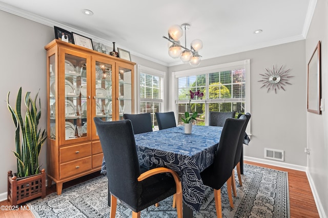 34 Mount Run, Tinton Falls, NJ 07753 - dining area featuring a chandelier, ornamental molding, baseboards, light wood-style floors, and recessed lighting
