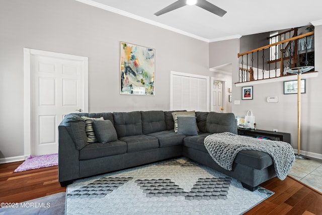 34 Mount Run, Tinton Falls, NJ 07753 - living area featuring wood finished floors, crown molding, a ceiling fan, and baseboards