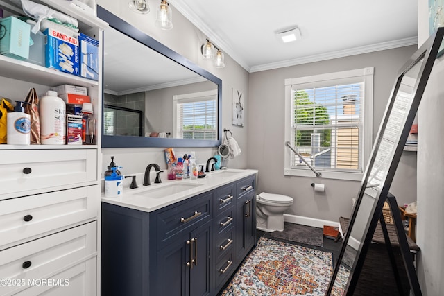 34 Mount Run, Tinton Falls, NJ 07753 - bathroom with double vanity, crown molding, toilet, plenty of natural light, and baseboards
