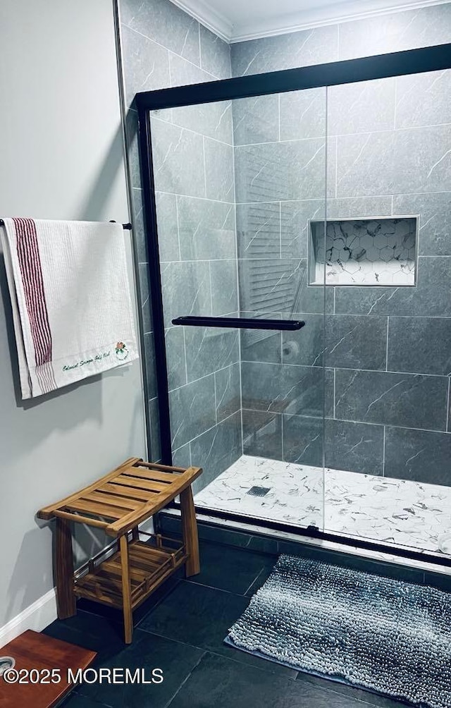 34 Mount Run, Tinton Falls, NJ 07753 - bathroom featuring a shower stall, baseboards, and ornamental molding