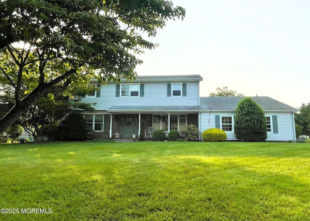 2146 Spruce Dr, Sea Girt, NJ 08750 - view of front facade featuring a front lawn