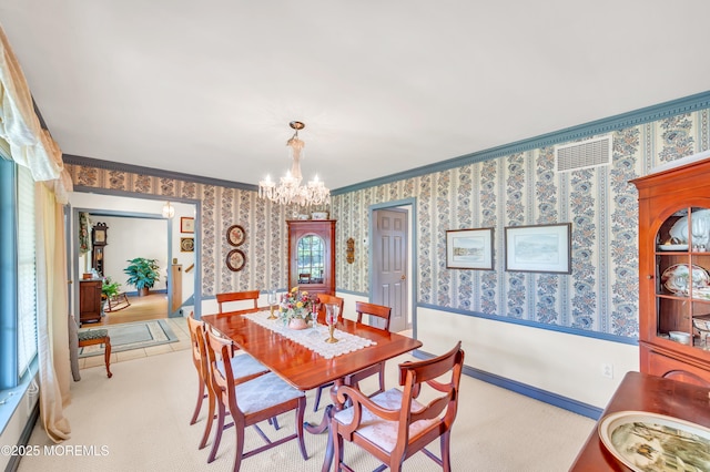 2146 Spruce Dr, Sea Girt, NJ 08750 - dining space with wallpapered walls, ornamental molding, a chandelier, and carpet floors