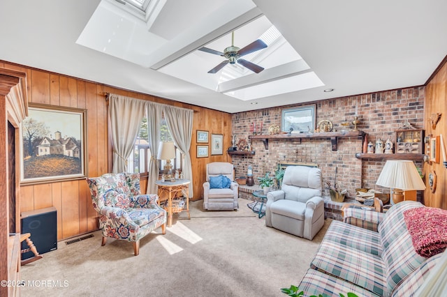 2146 Spruce Dr, Sea Girt, NJ 08750 - living area with a skylight, wood walls, carpet, ceiling fan, and a fireplace