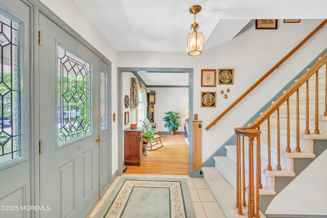 2146 Spruce Dr, Sea Girt, NJ 08750 - foyer featuring plenty of natural light, stairs, and light tile patterned flooring