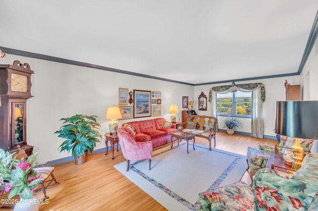 2146 Spruce Dr, Sea Girt, NJ 08750 - living area with ornamental molding, light wood-type flooring, and baseboards