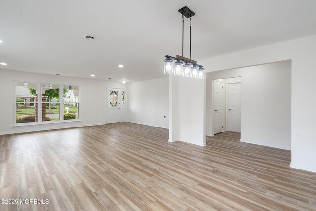 21 Turnbridge, Manchester, NJ 08759 - unfurnished living room with light wood-type flooring, recessed lighting, and baseboards