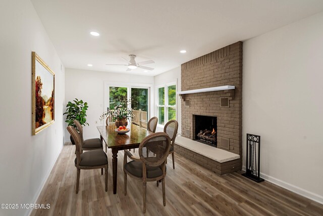 21 Turnbridge, Manchester, NJ 08759 - dining area featuring wood finished floors, ceiling fan, baseboards, a fireplace, and recessed lighting